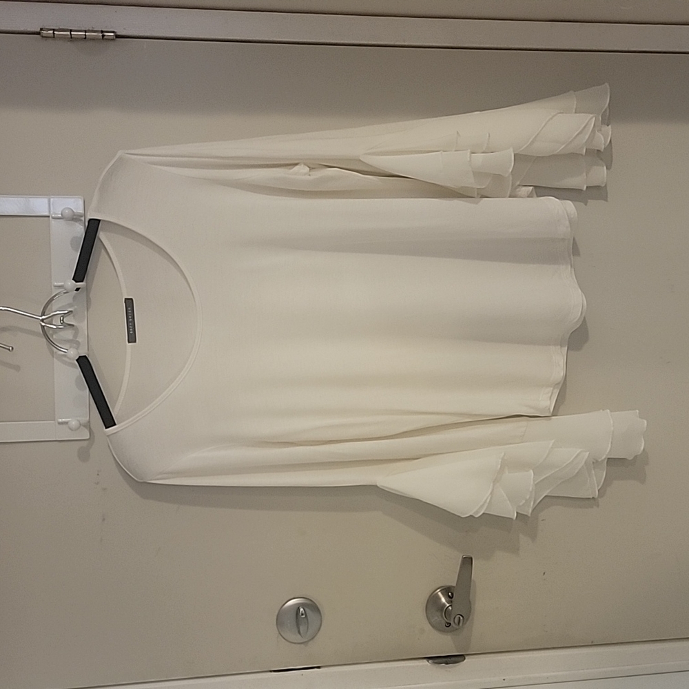 White top with bell sleeves